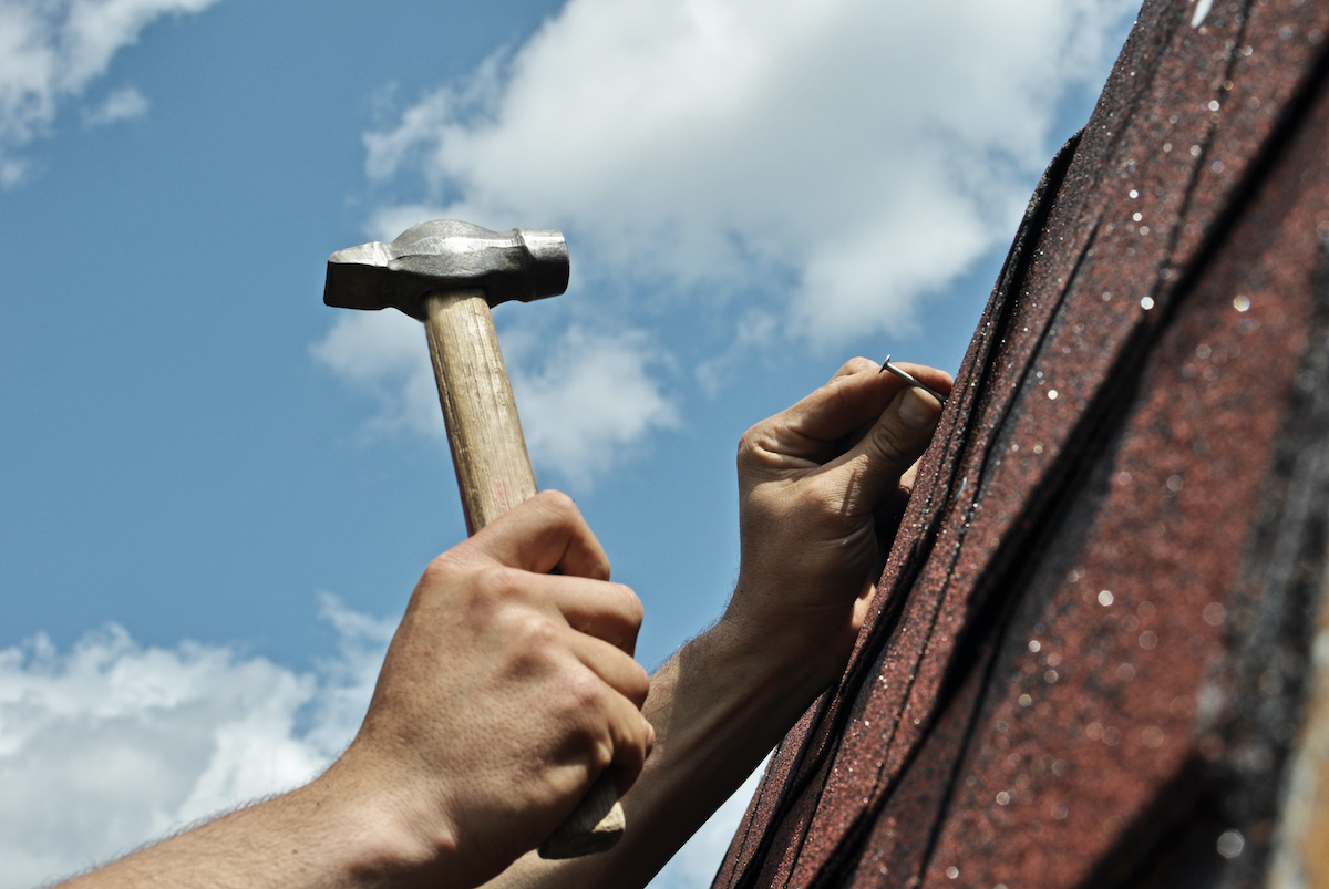 Homeowner in Spring, TX doing DIY roof repair