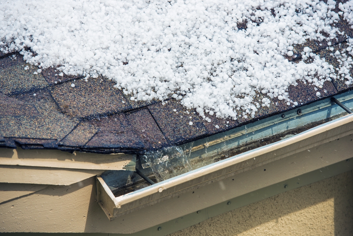 Rosenberg roof covered in hail and damaged by hail storm
