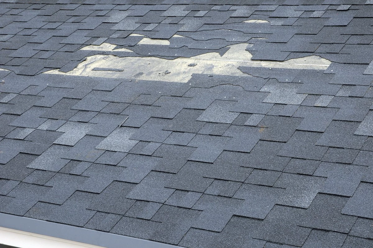 Damaged and missing Houston roof shingles that will lead to Kingwood roof inspection