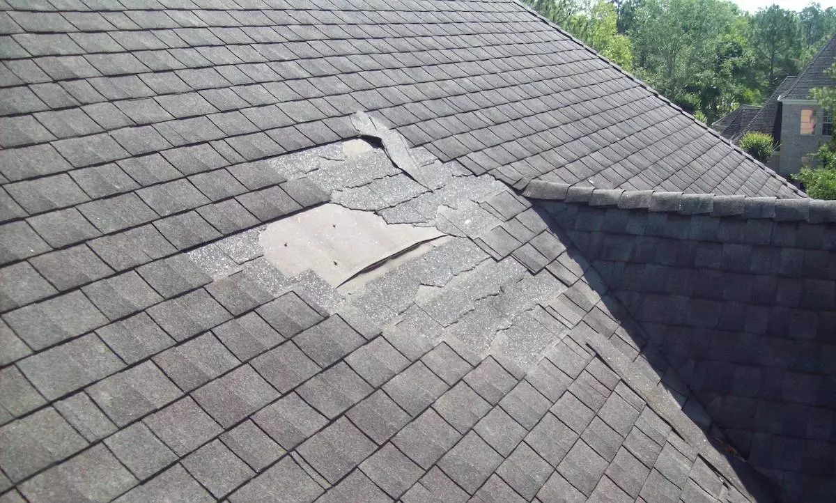 Section of Jersey Village roof damage that will lead to Jersey Village roof replacement