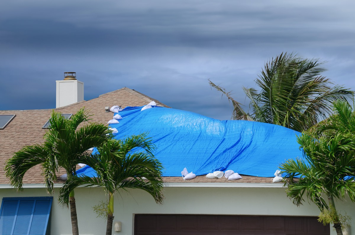 hurricane season roof damage taking place on a sugar land roof