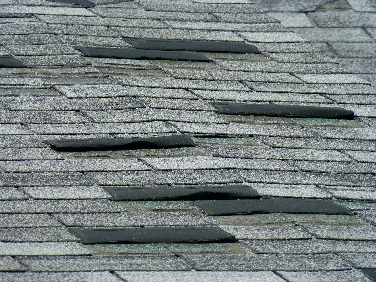 Mission bend roof damage that requires a roof replacement by our Houston roof experts