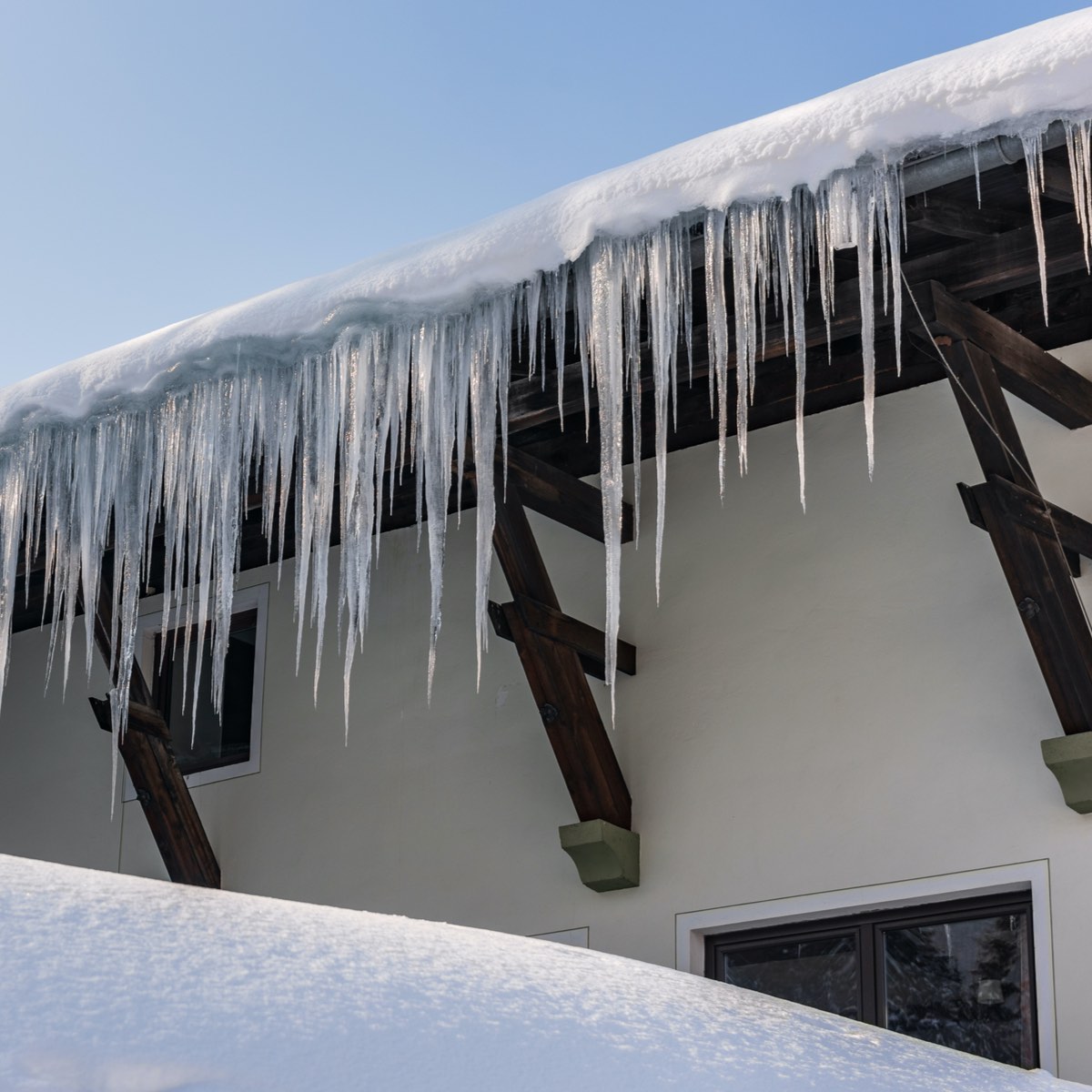 Katy winter roof damage caused by icicles and frozen roofing 