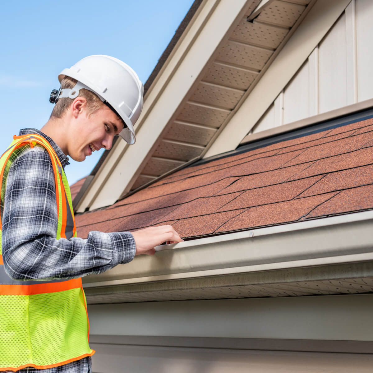 A Houston roofing company contractor conducts a Bellaire roof inspection.