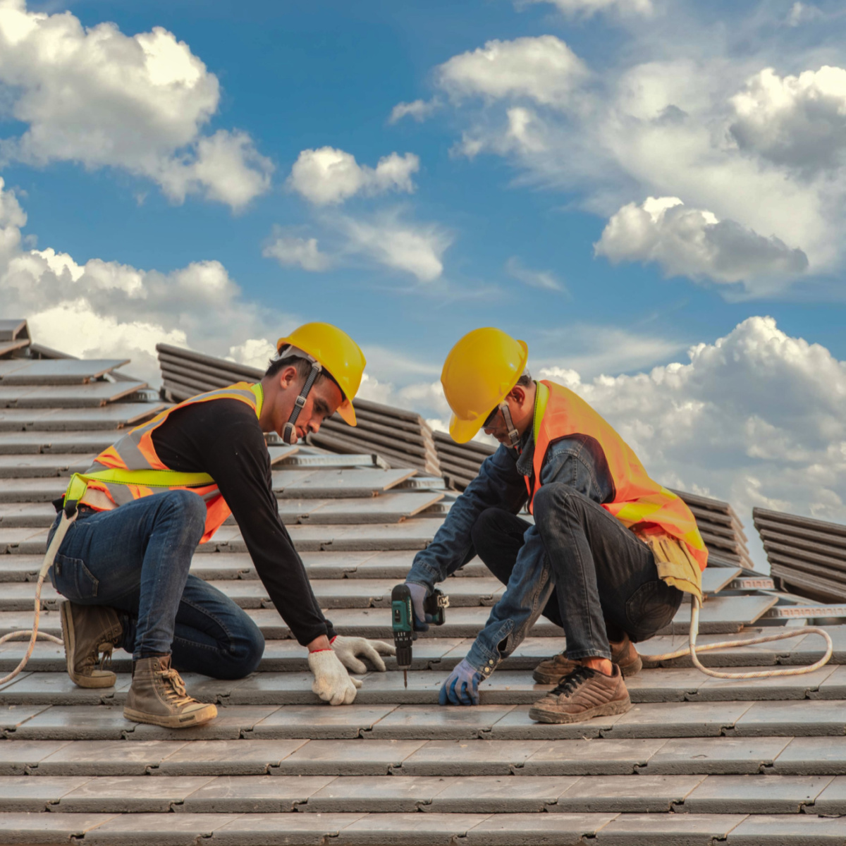 Houston roofing experts performing roof repairs as a reliable Kingwood roofer would.