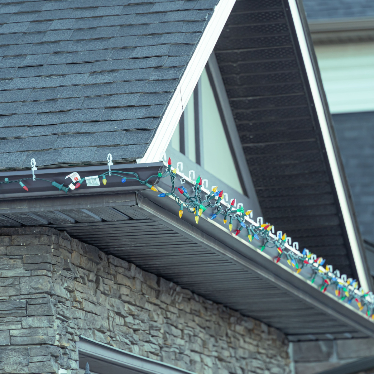 A roof that looks ready for the holidays that may need a Houston roof replacement from some Houston roofers.