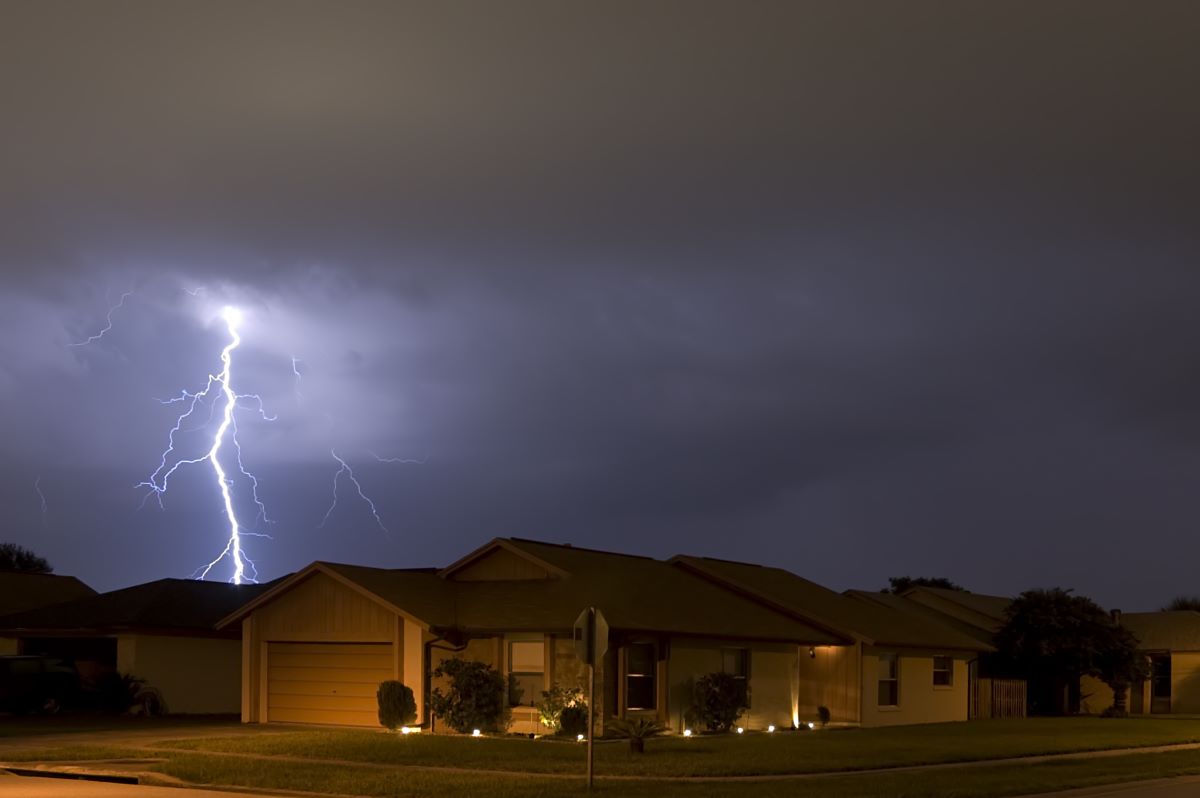 Lightning strikes during damaging storm that resulted in the need for Houston roof repairs.